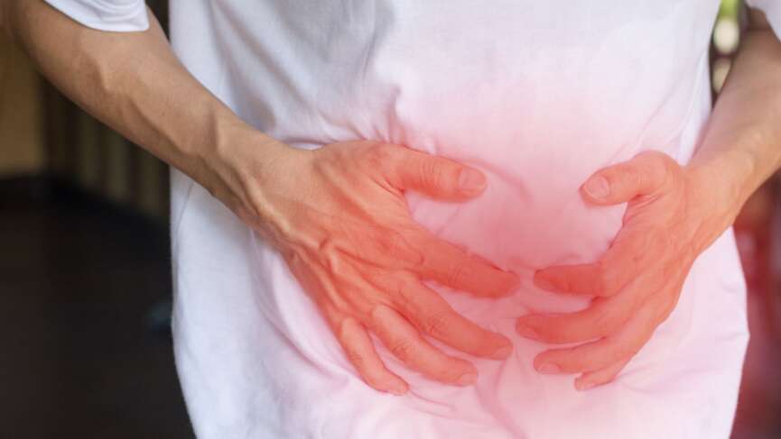 Man with upset stomach pain due to gallstones formation