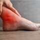 a young man having pain in his ankle representing reactive arthritis