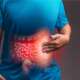 Internal digestive system with highlighted red inflammation on sick person, a man with stomach pain representing crohn's disease