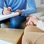 Psychologist therapy and woman talking in consultation for mental health in office guiding tips for mental health