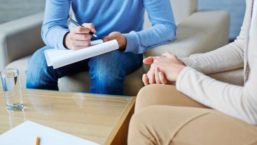 Psychologist therapy and woman talking in consultation for mental health in office guiding tips for mental health