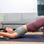 fitness athlete performing piriformis stretches for pain relief indoors