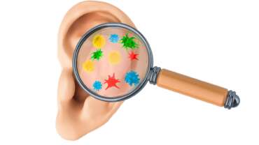 human ear with viruses and bacteria under magnifying glass, 3D rendering, natural representing causes and remedies for ear infection