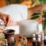 Ayurvedic aromatherapy massage, pouring aromatic oil in essential oil diffuser and benefits of aromatherapy