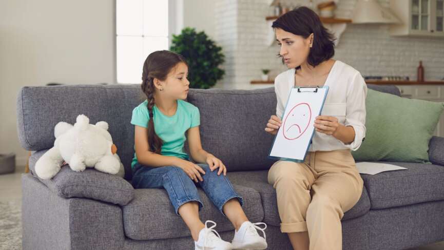 mom talking to daughter who is suffering from ADHD, supporting her at home representing adhd in females