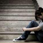 Depressed young woman with atypical depression