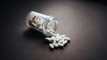 assortment of medicine on the table representing adderall for adhd