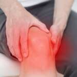 A man suffering from knee ache due to extreme osteoarthritis pain