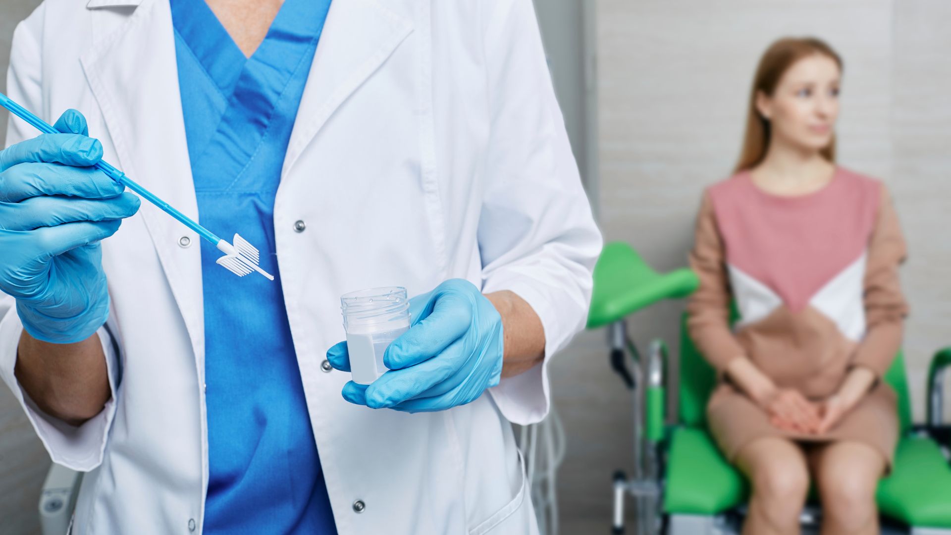 A gynecologist collects a pap smear sample for cervical cancer screening test