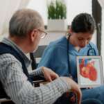 senior man with heart failure and normal ejection fraction meeting in medical office at hospital