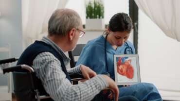 senior man with heart failure and normal ejection fraction meeting in medical office at hospital