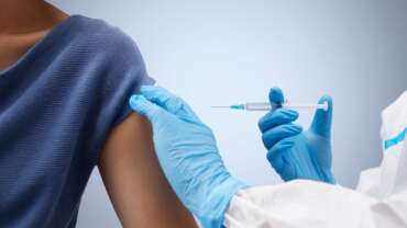 woman get vaccinated against rabies