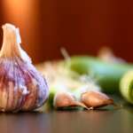 Peeled garlic cloves. garlic benefits concept