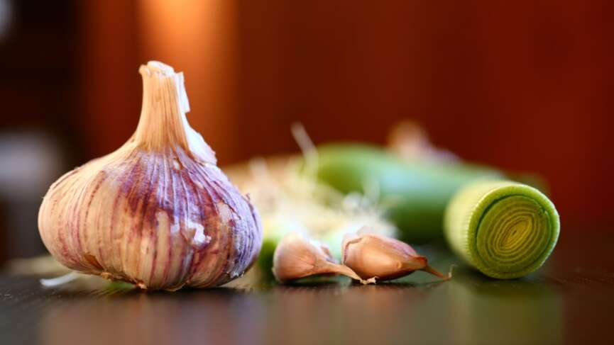 Peeled garlic cloves. garlic benefits concept
