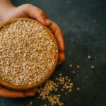 Quinoa in a wooden bowl close-up. quinoa health benefits benefits concept