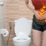 girl with stomach sickness in toilet. natural remedies for constipation concept