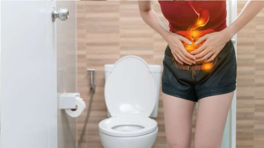 girl with stomach sickness in toilet. natural remedies for constipation concept