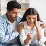 A worried young couple looking at a negative test. Foods that affects ovulation and sperm quality concept
