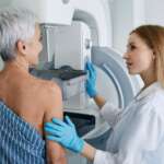 shot of a mature woman being comforted by a doctor before cancer screening and test