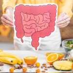 Young woman preparing a healthy meal and foods for gut health